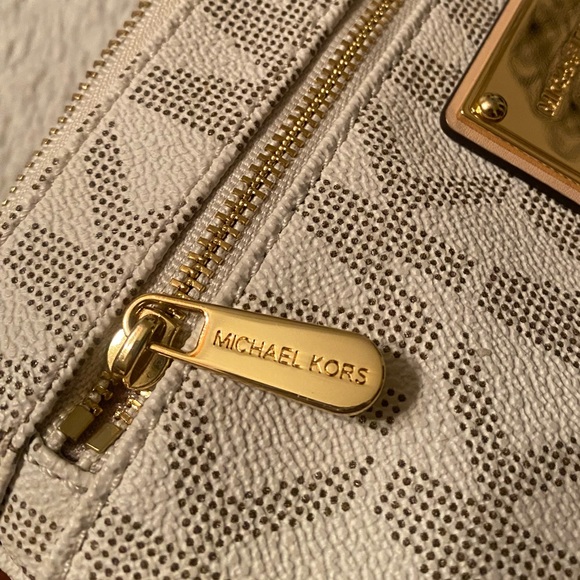 Michael Kors cream and tan wristlet, gold hardware, like new. - Picture 5 of 5
